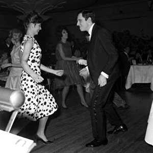 Dances The Twist. Anthony Newley and Alma Cogan in the background dancing at The Hungaria