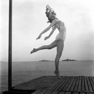 Dancing. Annie Mercur, The Queen of Paris seen here dancing on the Sards at Cannes