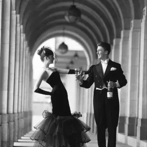 Two darlings of the deb set offer a toast to fashion as they prepared for a night of Two darlings of the deb set offer a toast to fashion as they prepared for a night of