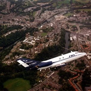 A Dassault Falcon 20 aircraft over Durham Cathedral and city