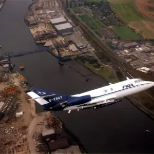 A Dassault Falcon 20 aircraft over the River Tees and the Transporter Bridge in A Dassault Falcon 20 aircraft over the River Tees and the Transporter Bridge in