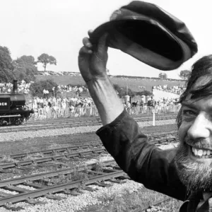 Dave Westcott of Derby throws his hat up in a salute to the little Sussex based Terrier
