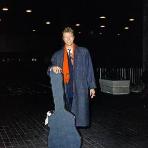 David Bowie at London Airport Print (23rd January 1990) David Bowie at London Airport Print (23rd January 1990)