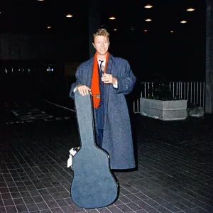 David Bowie at London Airport Print (23rd January 1990) David Bowie at London Airport Print (23rd January 1990)