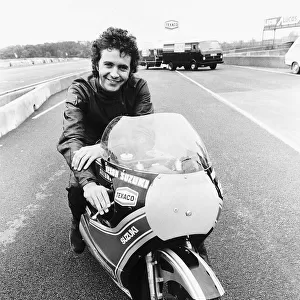 David Essex on the set of his film Silver Dream Racer sitting on a £40