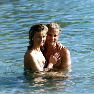 David Gower cricketer with Thorrun Nash in the sea during their visit to the West Indies David Gower cricketer with Thorrun Nash in the sea during their visit to the West Indies