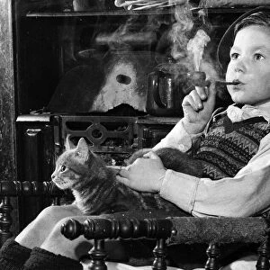 David Hutchinson (6) decides to give up smoking 1954 after five years but still
