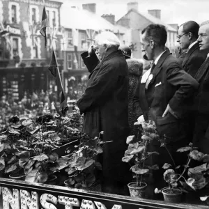 David Lloyd George taking the salute at the Eisteddfod. Also in the picture are Mr R O David Lloyd George taking the salute at the Eisteddfod. Also in the picture are Mr R O
