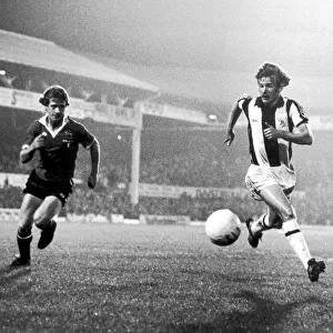 David Mills attacking the Manchester United goal area with Jimmy Nicholls in pursuit