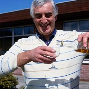 Davie Provan pouring glass of whiskey May 1989
