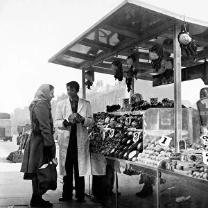 De-Luxe Street Stall. Takings doubled when a de-lux street stall opened for business in