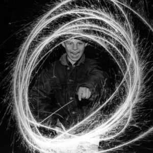 Dean Lokko of Rhyl has fun with sparklers on Bonfire night. 11th November 1993 Dean Lokko of Rhyl has fun with sparklers on Bonfire night. 11th November 1993