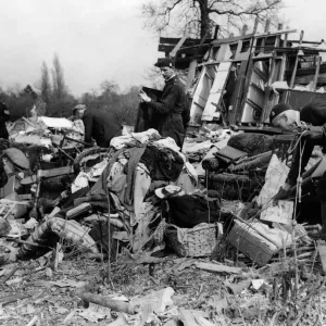 Death comes to evacuees living in army huts in a field. ARP rescue squads salvaging kids Death comes to evacuees living in army huts in a field. ARP rescue squads salvaging kids
