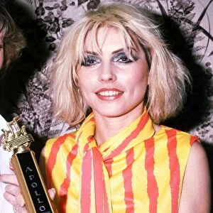 Deborah Harry of the pop group Blondie holding Apollo Theatre Glasgow trophy