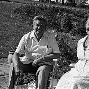 Denis Healey in the garden at his home in Sussex with his wife Edna. 30th May 1985