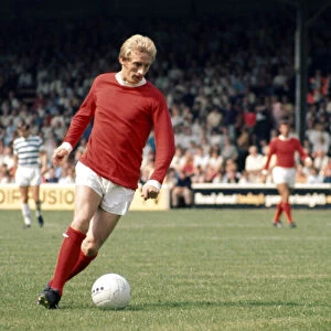 Denis Law in action for Manchester United during their English League Division One match