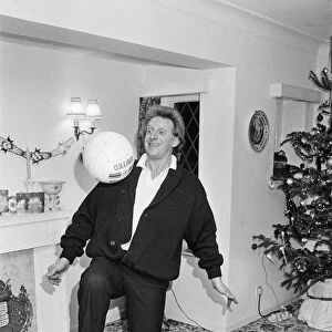 Denis Law, at home over Christmas in 1987. Denis Law CBE