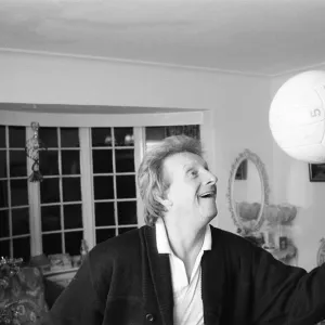 Denis Law, at home over Christmas in 1987. Denis Law CBE Denis Law, at home over Christmas in 1987. Denis Law CBE