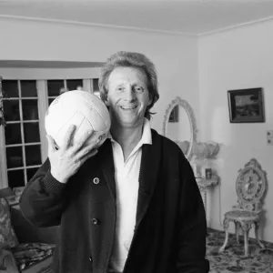 Denis Law, at home over Christmas in 1987. Denis Law CBE Denis Law, at home over Christmas in 1987. Denis Law CBE