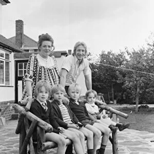 Denis Law, Manchester City football player, pictured at home with family in Bowden