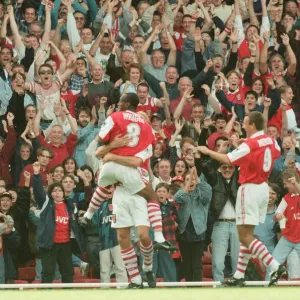 Dennis Bergkamp celebrates his first ever goal for his new club Arsenal Dennis Bergkamp celebrates his first ever goal for his new club Arsenal