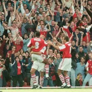 Dennis Bergkamp celebrates his first ever goal for his new club Arsenal Dennis Bergkamp celebrates his first ever goal for his new club Arsenal