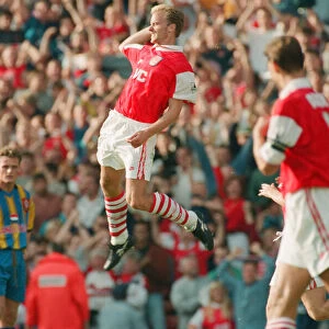 Dennis Bergkamp celebrates his second goal for his new club Arsenal