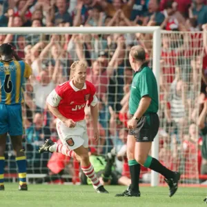 Dennis Bergkamp celebrates his second goal for his new club Arsenal Dennis Bergkamp celebrates his second goal for his new club Arsenal