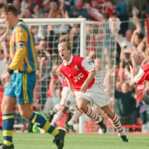 Dennis Bergkamp celebrates his second goal for his new club Arsenal Dennis Bergkamp celebrates his second goal for his new club Arsenal