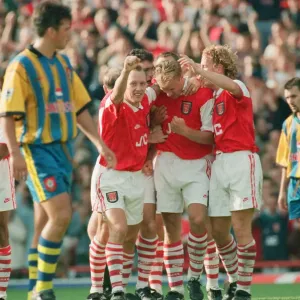 Dennis Bergkamp celebrates his second goal for his new club Arsenal Dennis Bergkamp celebrates his second goal for his new club Arsenal