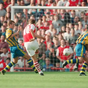 Dennis Bergkamp scores his second goal for his new club Arsenal Dennis Bergkamp scores his second goal for his new club Arsenal