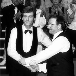 Dennis Taylor comiserates Steve Davis after winning the Embassy Snooker World