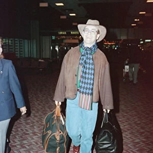 The departure of Elton John to New York. London Heathrow Airport. 28th November 1991