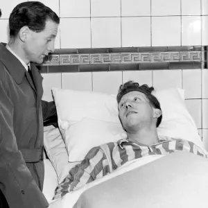 Derek Dooley is visited in hospital by Preston and England Winger Tom Finney after Dooley