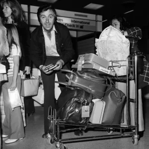 Des O Connor at the airport with his family. 3rd August 1974 Des O Connor at the airport with his family. 3rd August 1974