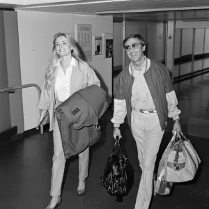 Des O'Connor Arrives at Heathrow with Girlfriend, 1984 Print