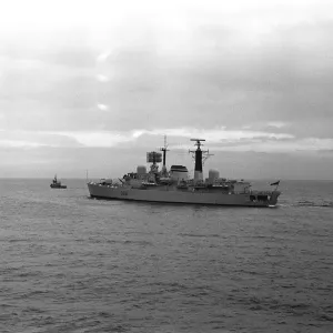 The destroyer HMS Glasgow puts to sea from the River Tyne on her way to Portsmouth to be