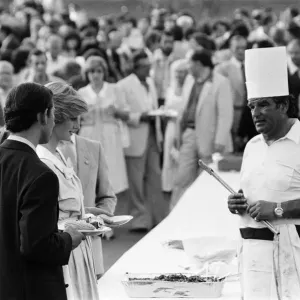 Diana, Princess of Wales and Prince Charles, Prince of Wales at a barbecue in their Diana, Princess of Wales and Prince Charles, Prince of Wales at a barbecue in their