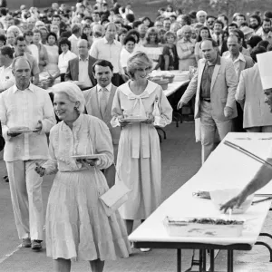 Diana, Princess of Wales and Prince Charles, Prince of Wales at a barbecue in their Diana, Princess of Wales and Prince Charles, Prince of Wales at a barbecue in their