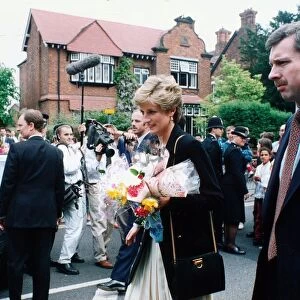 Diana, Princess of Wales during a visit to Rugby. She is seen here at Fawsley House Red