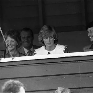 Diana, Princess of Wales watches her husband playing polo during a visit Auckland