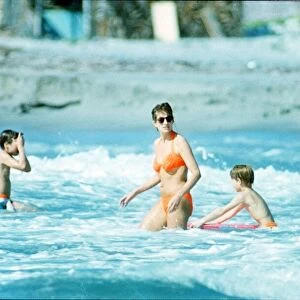 Diana, Princess of Wales in the water with her children Prince William