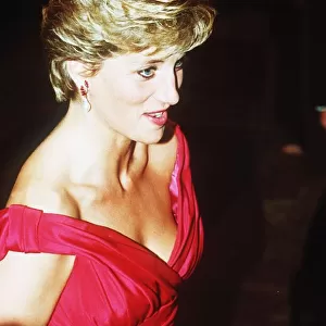 Diana, Princess of Wales, wearing a Victor Edelstein evening dress to a performance of