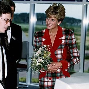 Diana, Princess of Wales wears a a Catherine Walker tartan coat dress