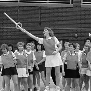Diane Sykes, of Slaithwaite demonstrates the game of bench quoits to women who took part