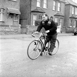 Dickie Bird seen here with his hand pedal bike. 1958 A218-002