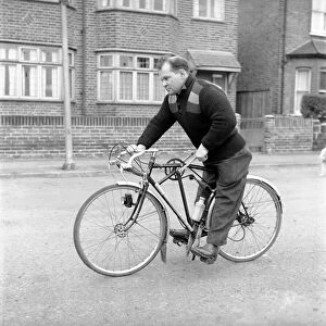 Dickie Bird seen here with his hand pedal bike. 1958 A218-003