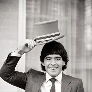 Diego Maradona - Football Player - May 1986 wearing suit and tie