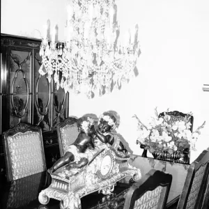 The dining room with its chandelier and ornamental clock September 1983 The dining room with its chandelier and ornamental clock September 1983