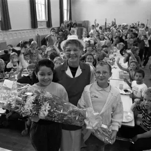 Dinner-lady Mrs Doreen Pounder has retired after 28 years at two Huddersfield schools
